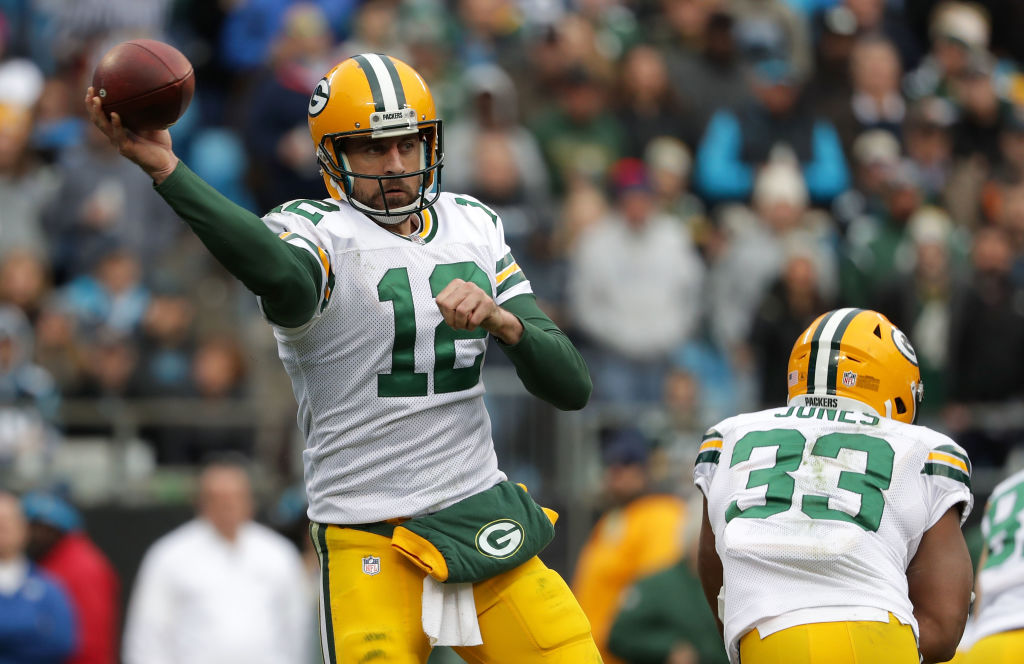 Aaron Rodgers of the Green Bay Packers throws a pass against the Carolina Panthers in the fourth quarter during their game at Bank of America Stadium on December 17, 2017 in Charlotte, North Carolina. (Photo by Streeter Lecka/Getty Images)