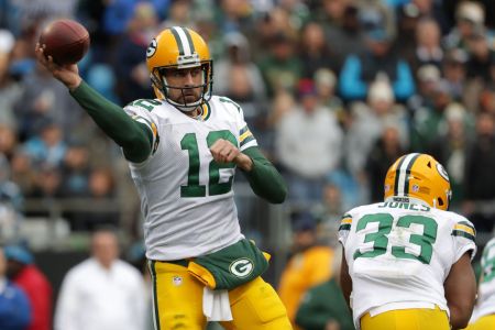 Aaron Rodgers of the Green Bay Packers throws a pass against the Carolina Panthers in the fourth quarter during their game at Bank of America Stadium on December 17, 2017 in Charlotte, North Carolina. (Photo by Streeter Lecka/Getty Images)