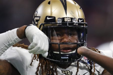 UCF Knights linebacker Shaquem Griffin reacts after a sack during the Chick-fil-A Peach Bowl.
 (Photo by Todd Kirkland/Icon Sportswire via Getty Images)
