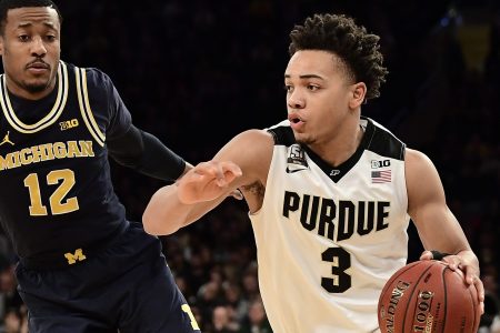 Carsen Edwards #3 of the Purdue Boilermakers drives against Muhammad-Ali Abdur-Rahkman #12 of the Michigan Wolverines during the championship game of the Big Ten Basketball Tournament.
 (Photo by Steven Ryan/Getty Images)