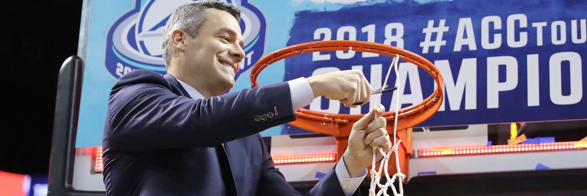 Head coach Tony Bennett of the Virginia Cavaliers cuts down the net after defeating the North Carolina Tar Heels 71-63 during the championship game of the 2018 ACC Men's Basketball Tournament. (Photo by Abbie Parr/Getty Images)