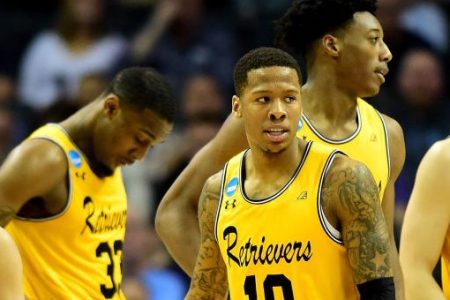 Jairus Lyles #10 of the UMBC Retrievers and teammates regroup between plays against the Kansas State Wildcats during the second round of the 2018 NCAA Men's Basketball Tournament. (Photo by Jared C. Tilton/Getty Images)