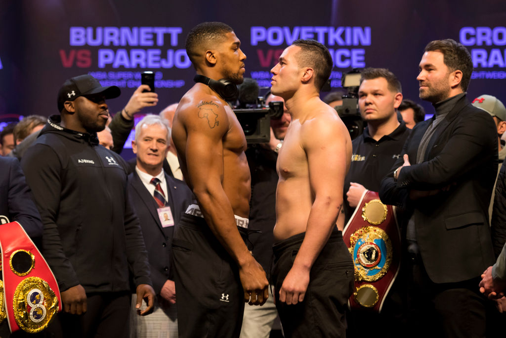 Anthony Joshua (L) and Joseph Parker (R) weigh-in at the Motorpoint Arena on March 30, 2018 in Cardiff, Wales. (Photo by Matthew Horwood/Getty Images)
