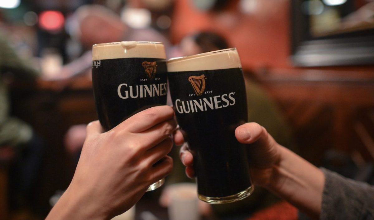 People enjoying a pint of Guinness in Dublin, Ireland in 2017, which experiences a sales spike each year ahead of St. Patrick's Day. (Getty Images/ Artur Widak/ NurPhoto)