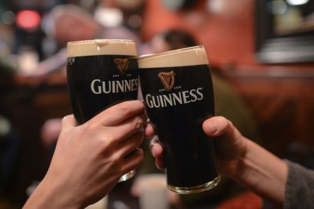 People enjoying a pint of Guinness in Dublin, Ireland in 2017, which experiences a sales spike each year ahead of St. Patrick's Day. (Getty Images/ Artur Widak/ NurPhoto)
