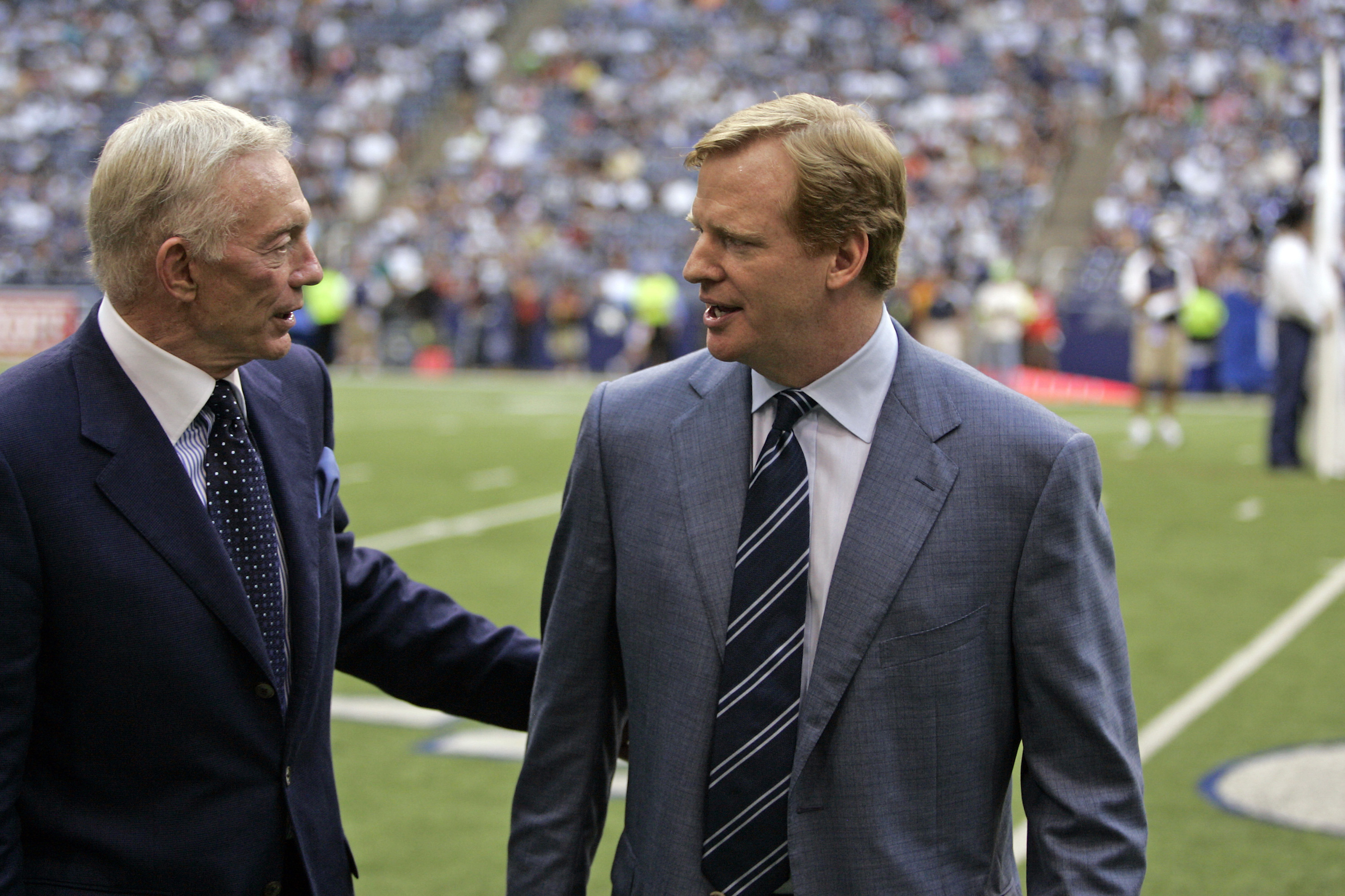 NFL commissioner Roger Goodell (right) visits with owner Jerry Jones (left) of the Dallas Cowboys during the Cowboys 45-35 win over the New York Giants at Texas Stadium in Irving, Texas. (Photo by James D. Smith /Icon SMI/Icon Sport Media via Getty Images)