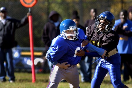 Andrew Dillard lost 16 pounds to play PeeWee football Andrew Dillard of Hyattsville, left, plays defense for the College Park Hornets. He made the team after dropping 16 pounds. Saturday they played the District Heights Chiefs.  (Photo by Katherine Frey/The Washington Post/Getty Images)