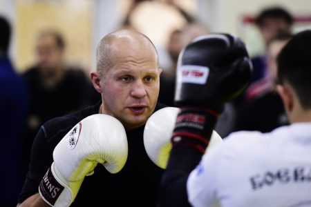 Russian mixed martial artist Fedor Emelianenko (L), president of the Russian MMA Union, multiple World Combat Sambo Champion, gives a masterclass to Primorye fighters at the Molodyozhny Sports Complex. Yuri Smityuk/TASS (Photo by Yuri SmityukTASS via Getty Images)