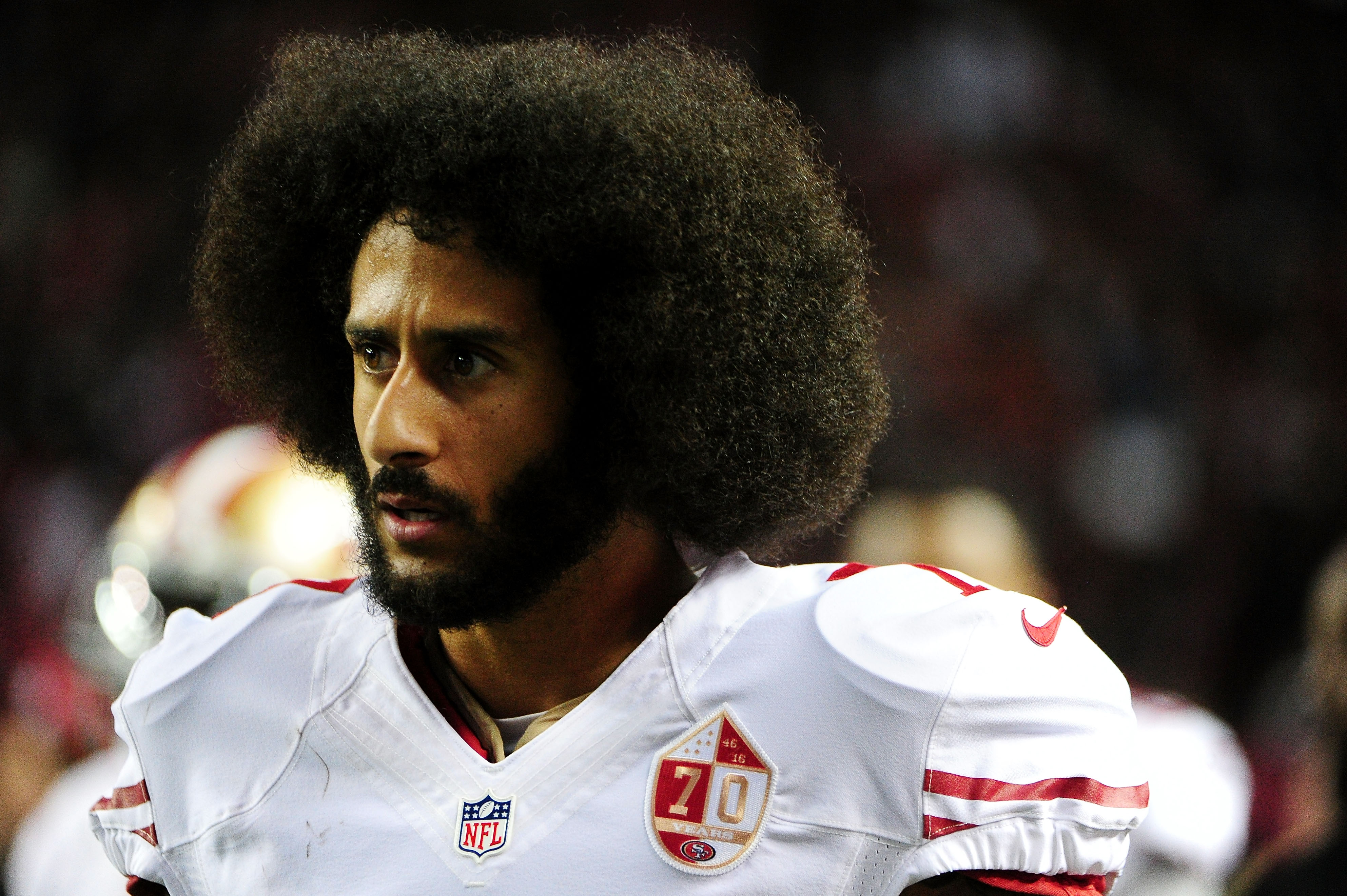 Colin Kaepernick #7 of the San Francisco 49ers looks on from the sidelines during the second half against the Atlanta Falcons at the Georgia Dome on December 18, 2016 in Atlanta, Georgia. (Photo by Scott Cunningham/Getty Images)