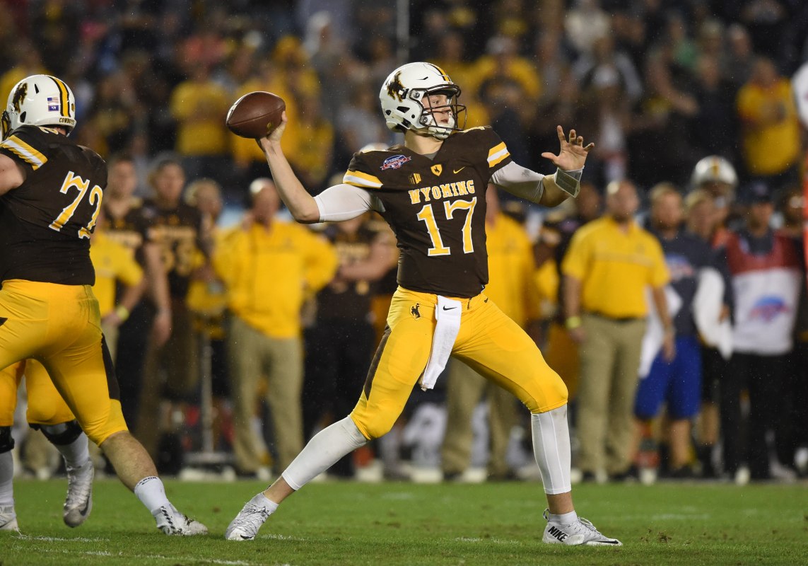 Wyoming (17) Josh Allen (QB) drops back to pass during the San Diego Credit Union Poinsettia Bowl game between the BYU Cougars and the Wyoming Cowboys on December 21, 2016, at Qualcomm Stadium in San Diego, CA. (Photo by Chris Williams/Icon Sportswire via Getty Images)