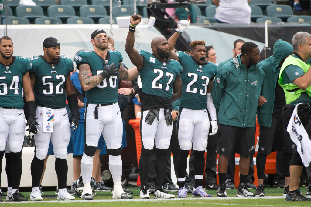 Eagles S Malcolm Jenkins (27), Eagles S Rodney McLeod (23), and Eagles DE Chris Long (56) stand together during the National Anthem before the game between the Arizona Cardinals and Philadelphia Eagles on October 08, 2017 at Lincoln Financial Field in Philadelphia, PA. (Photo by Kyle Ross/Icon Sportswire via Getty Images)