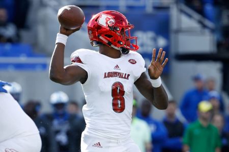 Lamar Jackson #8 of the Louisville Cardinals throws a  pass against the Kentucky Wildcats during the game at Commonwealth Stadium on November 25, 2017 in Lexington, Kentucky.  (Photo by Andy Lyons/Getty Images)