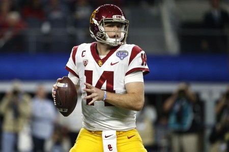 Sam Darnold #14 of the USC Trojans looks to throw against the Ohio State Buckeyes in the first half of the 82nd Goodyear Cotton Bowl Classic between USC and Ohio State at AT&T Stadium on December 29, 2017 in Arlington, Texas. (Photo by Ron Jenkins/Getty Images)