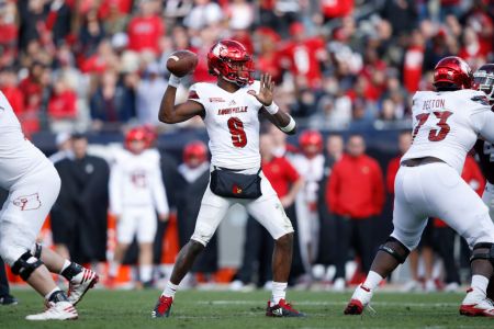 Lamar Jackson #8 of the Louisville Cardinals looks to pass against the Mississippi State Bulldogs during the TaxSlayer Bowl at EverBank Field on December 30, 2017 in Jacksonville, Florida. (Photo by Joe Robbins/Getty Images)