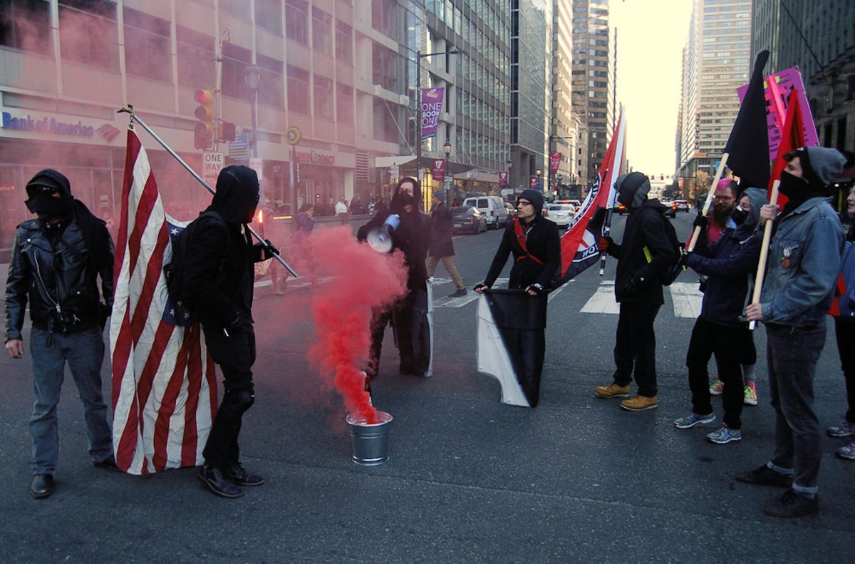 An Anti-Fascist group known as Philly Rebellion marked the arrest of more than 200 protesers one year ago at the Trump inauguration. (Photo by Cory Clark/NurPhoto via Getty Images.)