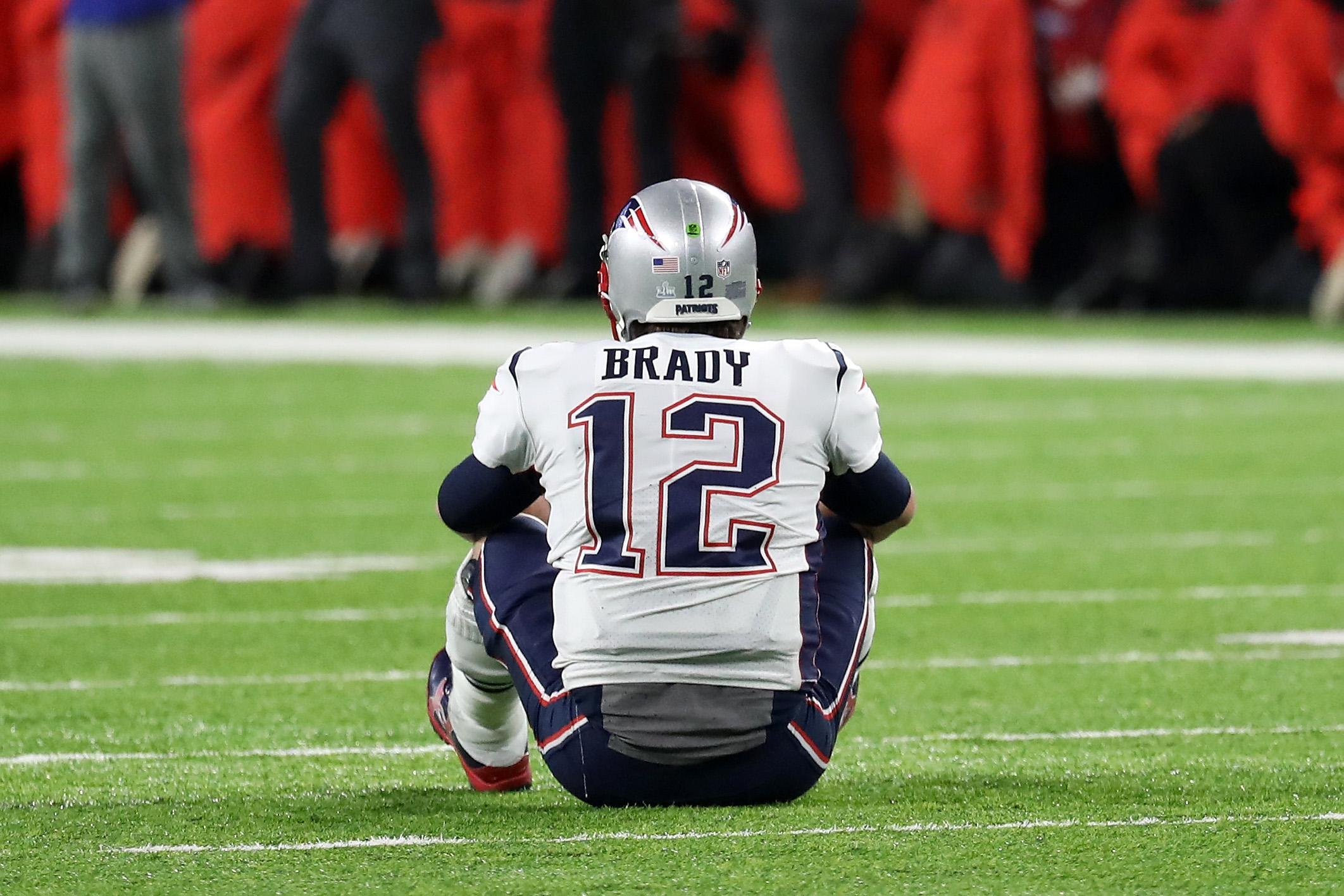 Tom Brady #12 of the New England Patriots reacts after fumbling the ball during the fourth quarter against the Philadelphia Eagles in Super Bowl LII at U.S. Bank Stadium on February 4, 2018 in Minneapolis, Minnesota.The Philadelphia Eagles defeated the New England Patriots 41-33. (Photo by Rob Carr/Getty Images)