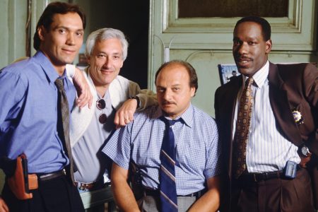 Jimmy Smits (left, as Det. Bobby Simone) joined executive producer Steven Bochco (second from left) and co-stars Dennis Franz (Det. Andy Sipowicz) and James McDaniel (Lt. Arthur Fancy) on the set of the ABC police drama "NYPD Blue." Smits, who replaced David Caruso in the second season, was first seen in the "Simone Says" episode of the series.,  (Photo by Timothy White/ABC via Getty Images)