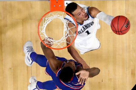 Jalen Brunson #1 of the Villanova Wildcats drives to the basket against Silvio De Sousa #22 of the Kansas Jayhawks during the 2018 NCAA Men's Final Four Semifinal at the Alamodome on March 31, 2018 in San Antonio, Texas.  (Photo by Ronald Martinez/Getty Images)