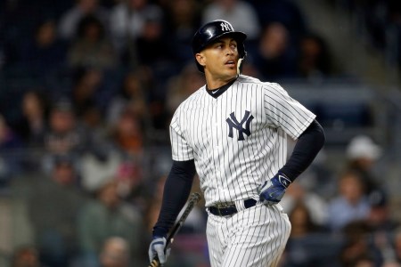 Giancarlo Stanton #27 of the New York Yankees at bat against the Baltimore Orioles during the third inning at Yankee Stadium on April 6, 2018 in the Bronx borough of New York City. (Photo by Adam Hunger/Getty Images)