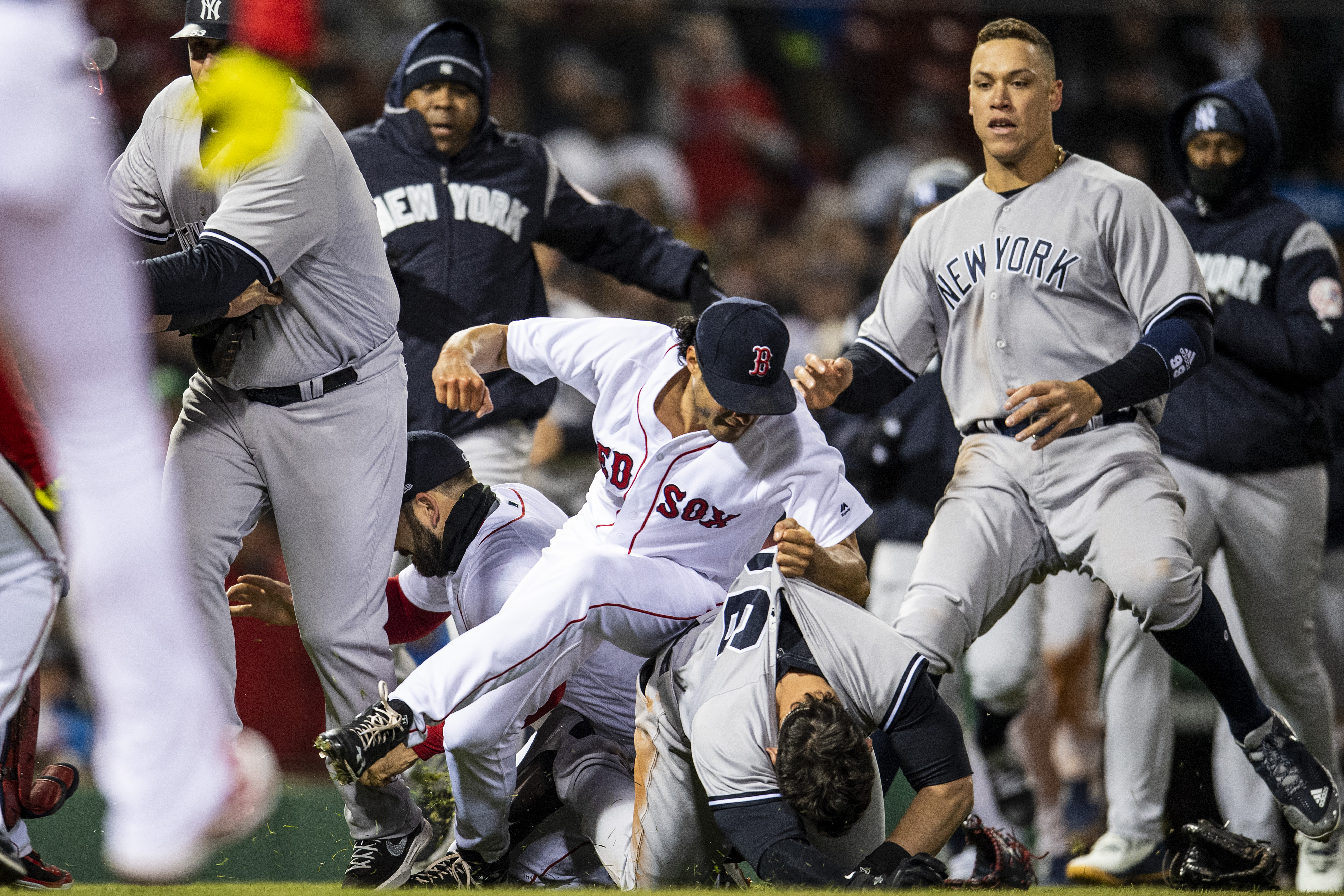 Tyler Austin #26 of the New York Yankees fights with Joe Kelly #46 of the Boston Red Sox after being hit by a pitch during the seventh inning of a game on April 11, 2018 at Fenway Park in Boston, Massachusetts. The play led to a benches clearing argument. (Photo by Billie Weiss/Boston Red Sox/Getty Images)