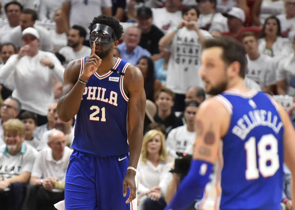 Joel Embiid #21 of the Philadelphia 76ers reacts after hitting a three pointer in the second quarter against the Miami Heat at American Airlines Arena on April 19, 2018 in Miami, Florida. (Photo by Eric Espada/Getty Images)