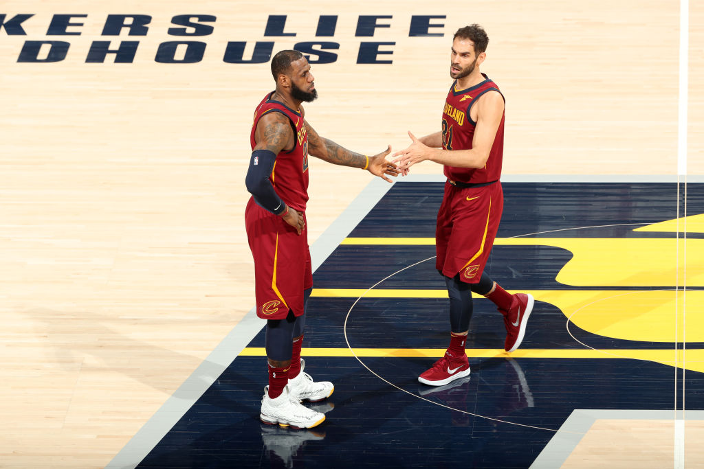LeBron James #23 and Jose Calderon #81 of the Cleveland Cavaliers high five during the game against the Indiana Pacers in Game Four of Round One of the 2018 NBA Playoffs on April 22, 2018 at Bankers Life Fieldhouse in Indianapolis, Indiana. (Photo by Nathaniel S. Butler/NBAE via Getty Images)