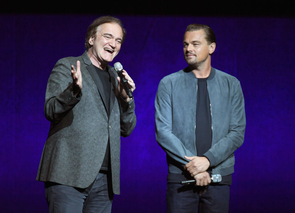 Director Quentin Tarantino (L) and Actor Leonardo DiCaprio speak onstage during CinemaCon 2018 (Photo by Ethan Miller/Getty Images for CinemaCon)
