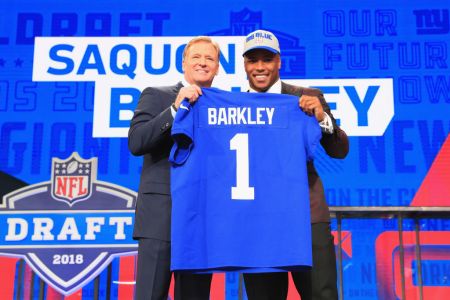 Saquon Barkley of Penn State poses with NFL Commissioner Roger Goodell after being picked #2 overall by the New York Giants during the first round of the 2018 NFL Draft at AT&T Stadium on April 26, 2018 in Arlington, Texas.  (Photo by Tom Pennington/Getty Images)