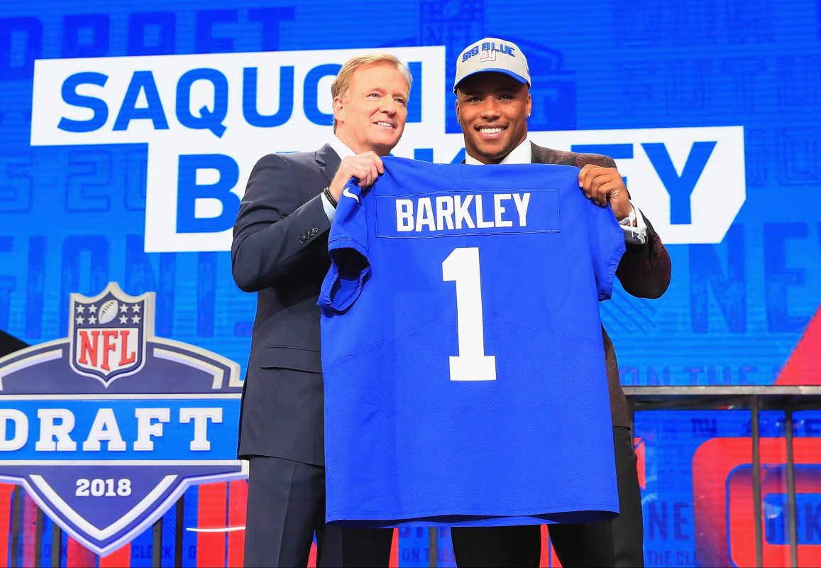 Saquon Barkley of Penn State poses with NFL Commissioner Roger Goodell after being picked #2 overall by the New York Giants during the first round of the 2018 NFL Draft at AT&T Stadium on April 26, 2018 in Arlington, Texas.  (Photo by Tom Pennington/Getty Images)