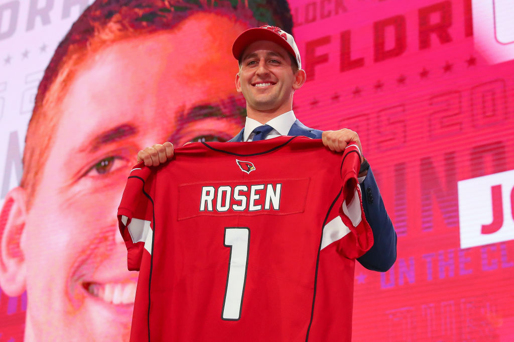 Josh Rosen poses with a jersey after being chosen by the Arizona Cardinals with the tenth overall pick during the first round at the 2018 NFL Draft at AT&T Statium on April 26, 2018 at AT&T Stadium in Arlington Texas.  (Photo by Rich Graessle/Icon Sportswire via Getty Images)