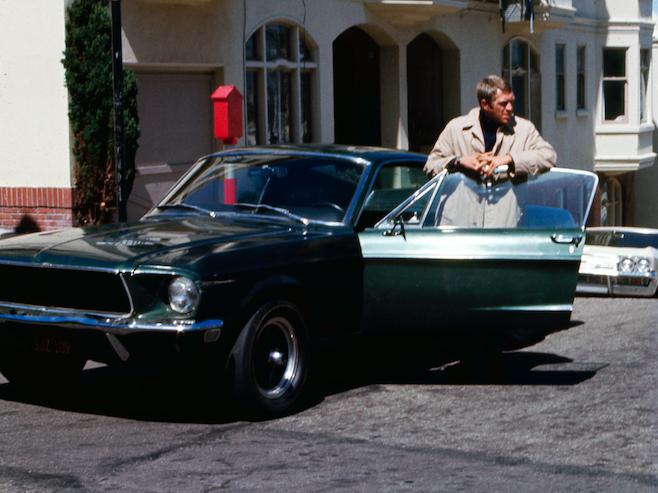 American actor Steve McQueen (1930 - 1980) as Frank Bullit next to a Ford Mustang 390 GT 2+2 Fastback in the american crime thriller movie 'Bullitt', San Francisco, 1968. (Photo by Silver Screen Collection/Getty Images)
