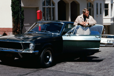 American actor Steve McQueen (1930 - 1980) as Frank Bullit next to a Ford Mustang 390 GT 2+2 Fastback in the american crime thriller movie 'Bullitt', San Francisco, 1968. (Photo by Silver Screen Collection/Getty Images)