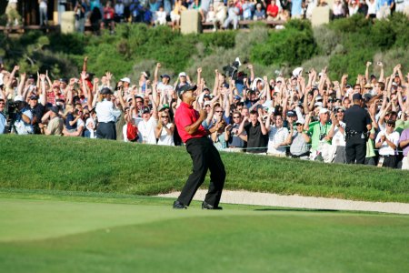 Tiger Woods birdies the 18th hole and celebrates to send it to a playoff round against Rocco Mediate (not pictured) during the final round of the US Open Championship at Torrey Pines South Golf Course in San Diego, CA. (Charles Baus/Icon Sportswire via Getty Images)