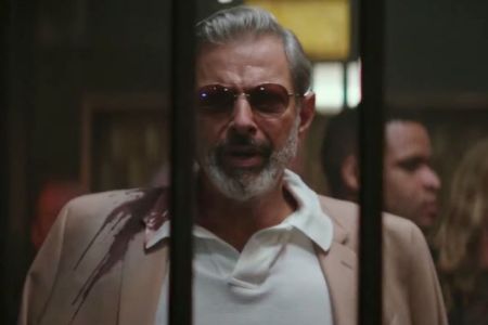 Jeff Goldblum is spattered in blood as he arrives at 'Hotel Artemis' in the brand new trailer. (YouTube) 