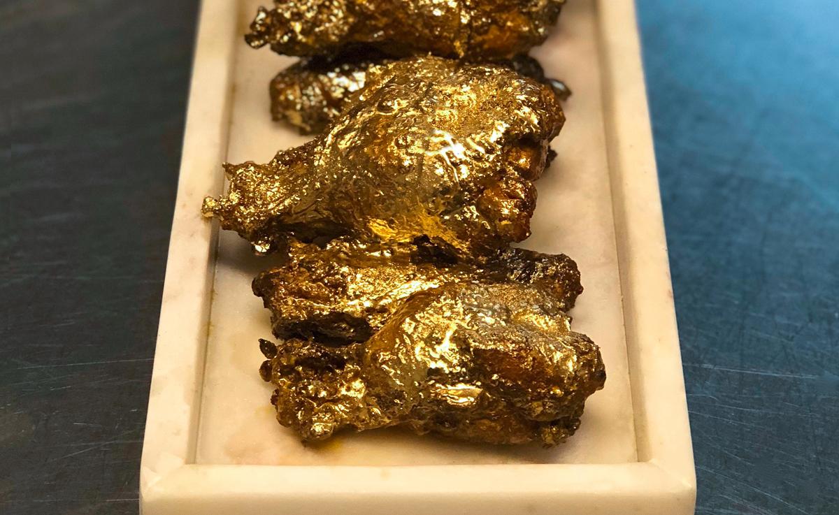 The 24-karat wings from The Ainsworth. (via The Ainsworth and @foodninfo on Instagram)