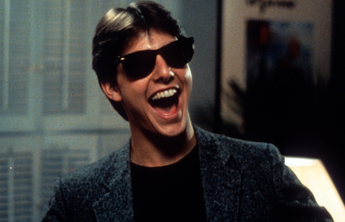 Tom Cruise laughs in a scene from the film 'Risky Business', 1983. (Warner Brothers/Getty Images)