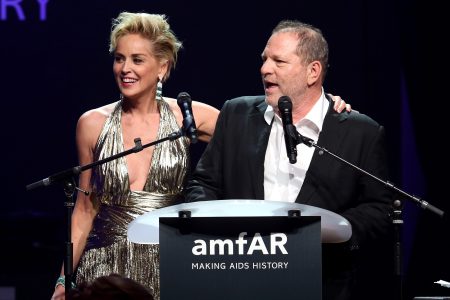 Sharon Stone (L) and Harvey Weinstein speak onstage during amfAR's 21st Cinema Against AIDS Gala Presented By WORLDVIEW, BOLD FILMS, And BVLGARI at Hotel du Cap-Eden-Roc on May 22, 2014 in Cap d'Antibes, France.  (Photo by Tim P. Whitby/Getty Images for amfAR)