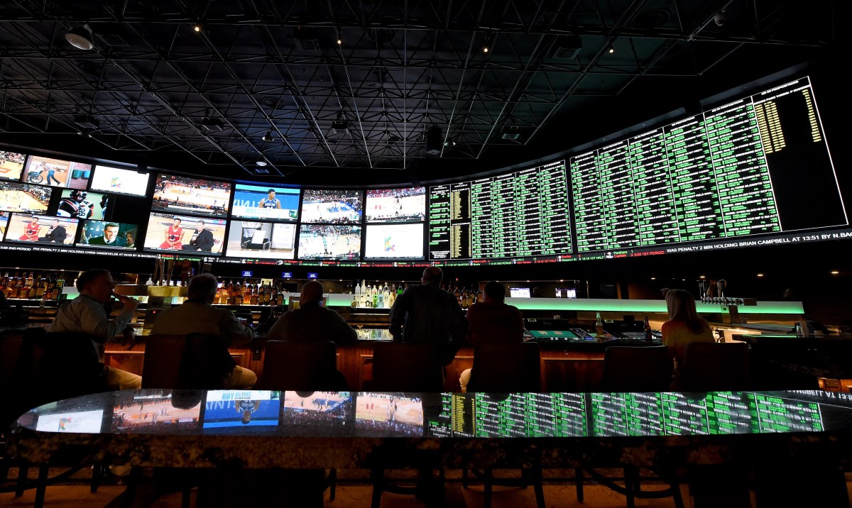 The betting line and some of the nearly 400 proposition bets for Super Bowl 50 between the Carolina Panthers and the Denver Broncos are displayed at the Race & Sports SuperBook at the Westgate Las Vegas Resort & Casino on February 2, 2016 in Las Vegas, Nevada. The newly renovated sports book has the world's largest indoor LED video wall with 4,488 square feet of HD video screens measuring 240 feet wide and 20 feet tall.  (Photo by Ethan Miller/Getty Images)