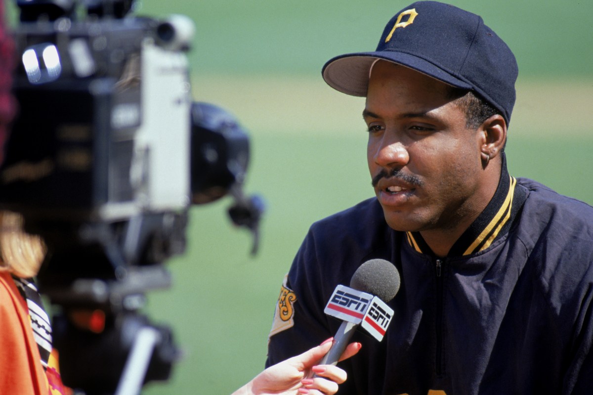 Barry Bonds #24 of the Pittsburgh Pirates talks to the media prior to a game against the Chicago Cubs in 1990 at Wrigley Field in Chicago.  (Jonathan Daniel/Getty Images)