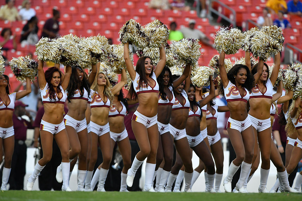 Cheerleaders for the Washington Redskins cheer before the game between the Washington Redskins and the Buffalo Bills at FedExField on August 26, 2016 in Landover, Maryland. The Redskins defeated the Jets 22-18. (Larry French/Getty Images)