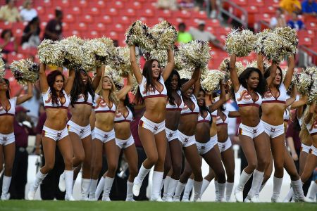 Cheerleaders for the Washington Redskins cheer before the game between the Washington Redskins and the Buffalo Bills at FedExField on August 26, 2016 in Landover, Maryland. The Redskins defeated the Jets 22-18. (Larry French/Getty Images)
