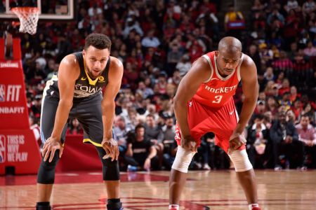 Stephen Curry #30 of the Golden State Warriors and Chris Paul #3 of the Houston Rockets looks on during the game on January 20, 2018 at the Toyota Center in Houston, Texas. (Photo by Bill Baptist/NBAE via Getty Images)