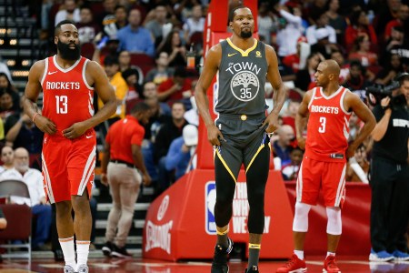 James Harden #13 of the Houston Rockets, Kevin Durant #35 of the Golden State Warriors and Chris Paul #3 of the Houston Rockets at Toyota Center on January 20, 2018 in Houston, Texas. NOTE TO USER: User expressly acknowledges and agrees that, by downloading and or using this photograph, User is consenting to the terms and conditions of the Getty Images License Agreement.  (Photo by Bob Levey/Getty Images)