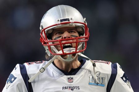 Tom Brady #12 of the New England Patriots takes the field before playing against the Philadelphia Eagles in Super Bowl LII at U.S. Bank Stadium on February 4, 2018 in Minneapolis, Minnesota. (Photo by Patrick Smith/Getty Images)
