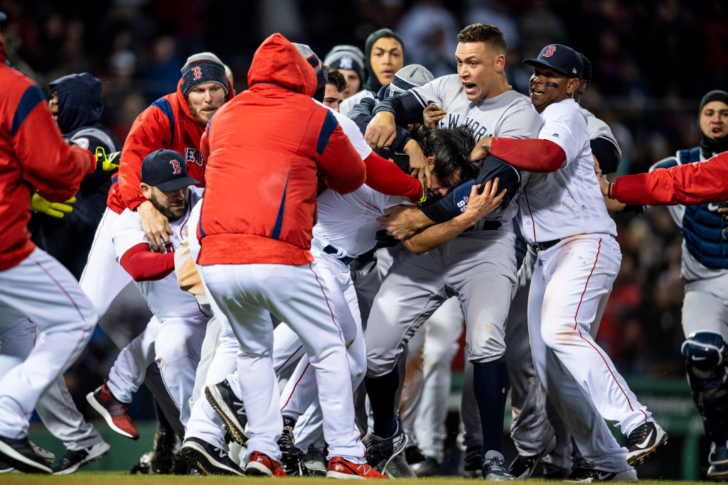 Aaron Judge #99 of the New York Yankees fights with Joe Kelly #46 of the Boston Red Sox after Tyler Austin #26 was hit by a pitch during the seventh inning of a game on April 11, 2018 at Fenway Park in Boston, Massachusetts. (Photo by Billie Weiss/Boston Red Sox/Getty Images)