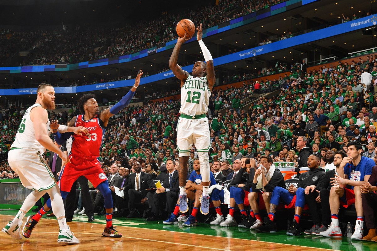 Terry Rozier #12 of the Boston Celtics shoots the ball against the Philadelphia 76ers in Game One of the Eastern Conference Semifinals of the 2018 NBA Playoffs on April 30, 2018 at the TD Garden in Boston, Massachusetts. (Photo by Jesse D. Garrabrant/NBAE via Getty Images)