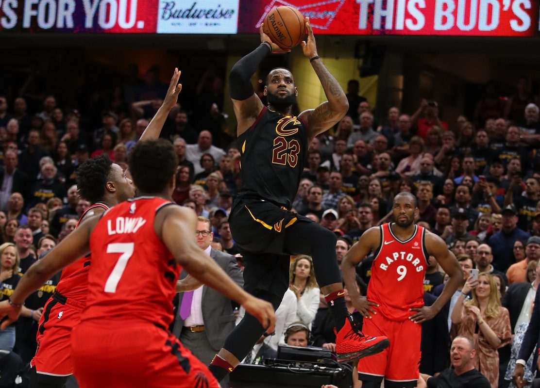 LeBron James #23 of the Cleveland Cavaliers hits the game winning shot over the outstretched hand of OG Anunoby #3 of the Toronto Raptors to win Game Three of the Eastern Conference Semifinals. (Photo by Gregory Shamus/Getty Images)