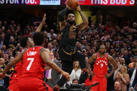 LeBron James #23 of the Cleveland Cavaliers hits the game winning shot over the outstretched hand of OG Anunoby #3 of the Toronto Raptors to win Game Three of the Eastern Conference Semifinals. (Photo by Gregory Shamus/Getty Images)