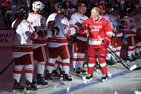 Russia's President Vladimir Putin (R) ahead of a Night Hockey League gala match at the Bolshoi Ice Palace. Alexei Nikolsky/Russian Presidential Press and Information Office/TASS (Photo by Alexei NikolskyTASS via Getty Images)
