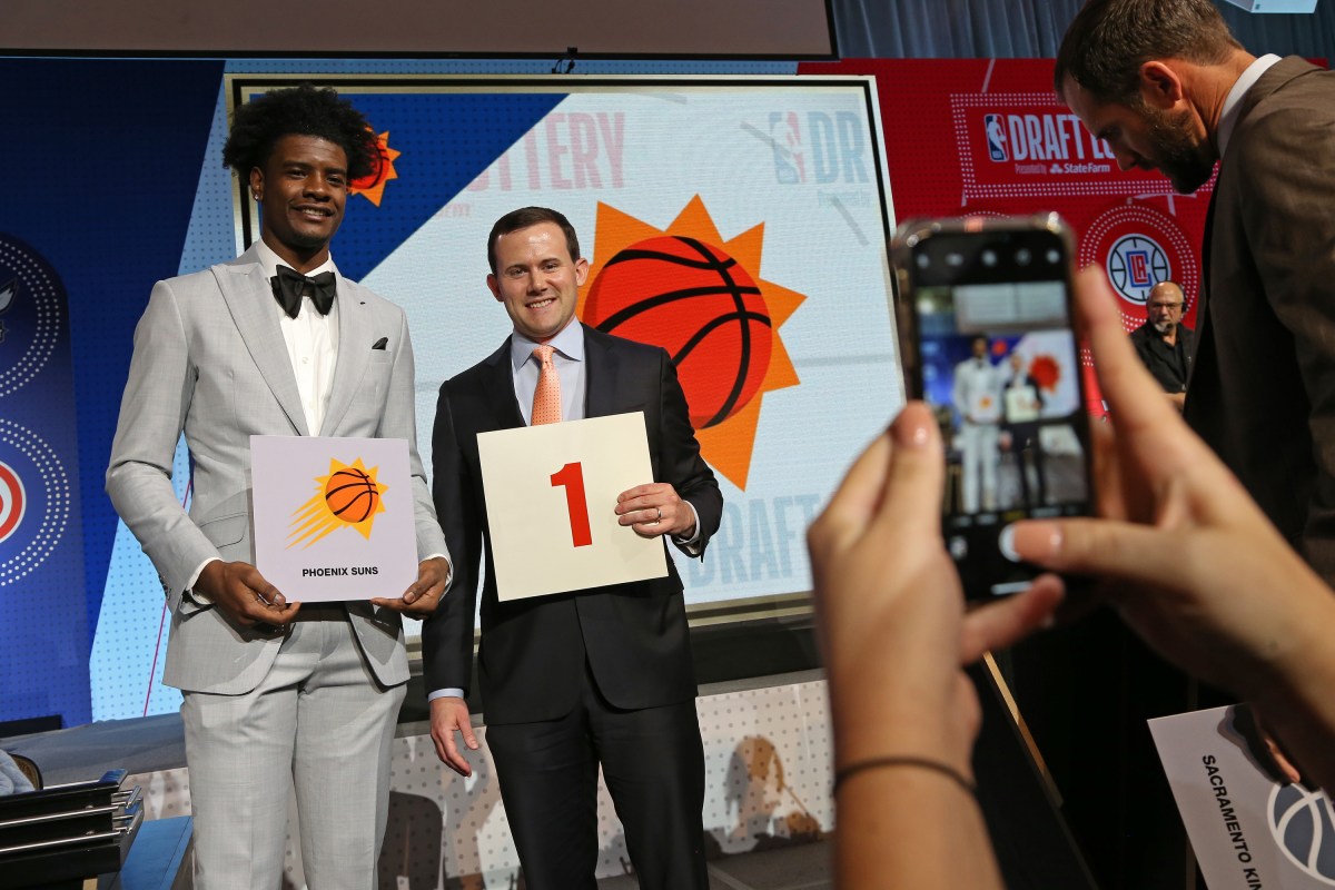 Josh Jackson #20 of the Phoenix Suns and General Manager of the Phoenix Suns, Ryan McDonough pose for a photo after getting the number one pick in the 2018 NBA Draft during the NBA Draft Lottery on May 15, 2018 at The Palmer House Hilton in Chicago, Illinois. (Photo by Gary Dineen/NBAE via Getty Images)